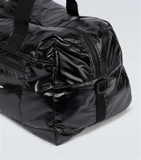 Nuxx technical holdall bag in black .